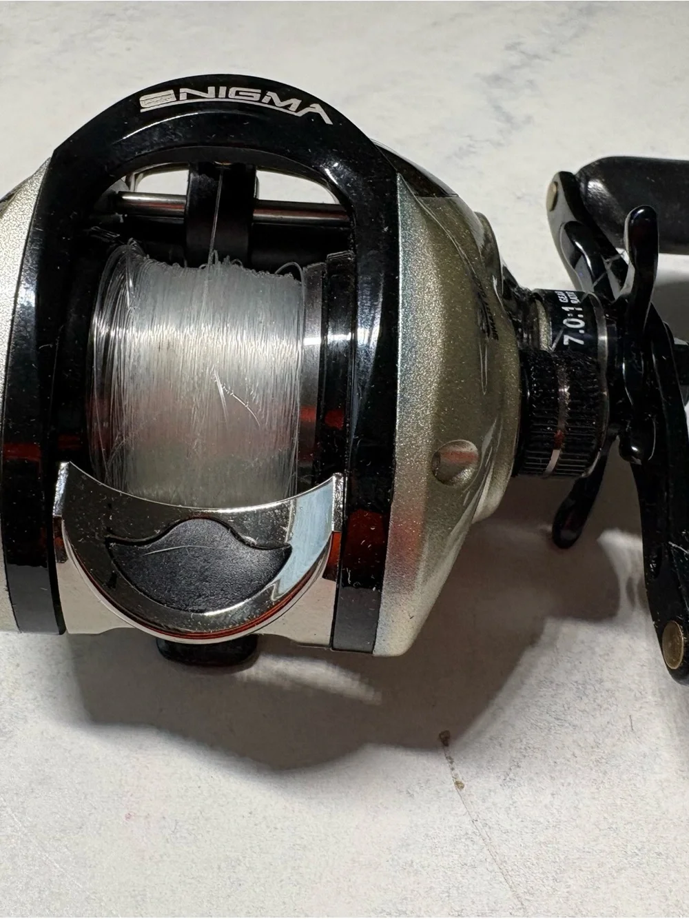 Bass Pro Shops Enigma Smart Cast Reel - Black and Gold - Picture 2 of 10